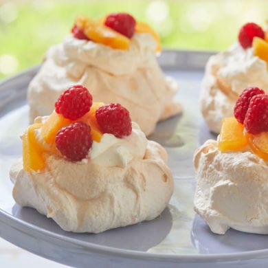 Meringues with Peach and Raspberry Compote