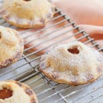 Peach Hand Pies lightly dusted with icing sugar.
