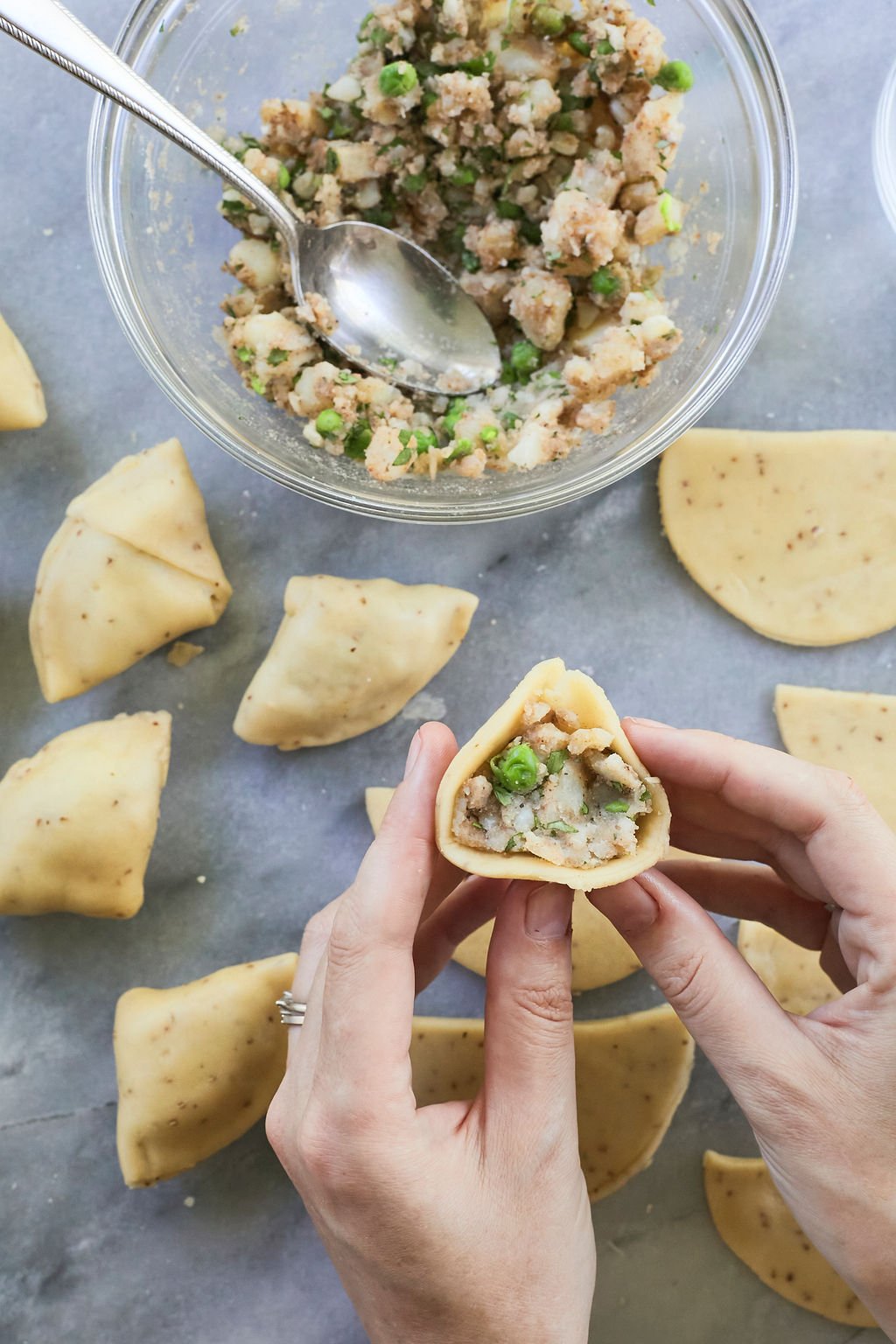 Samosas filled and ready to bake. A close up of how much vegan filling should go into my baked samosas.