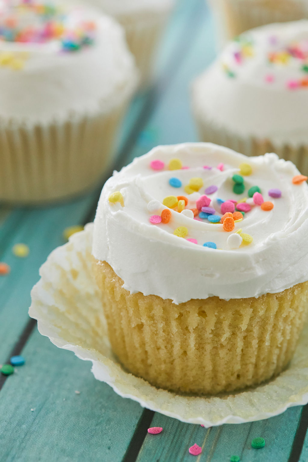 A close up of my vanilla cupcakes recipe finished and topped with buttercream.