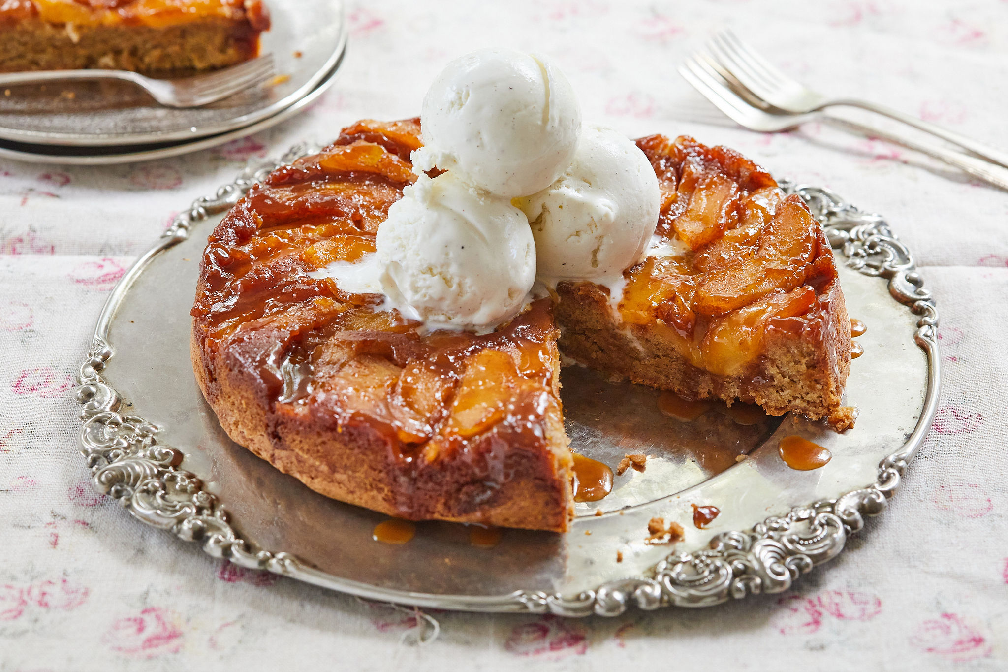Caramel Apple Upside Down Cake topped with ice cream.