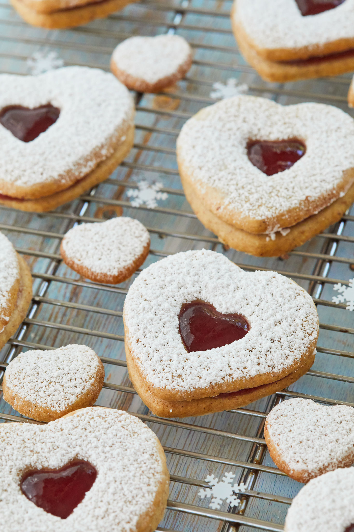 Homemade Classic Linzer Cookies on a cooling rack.