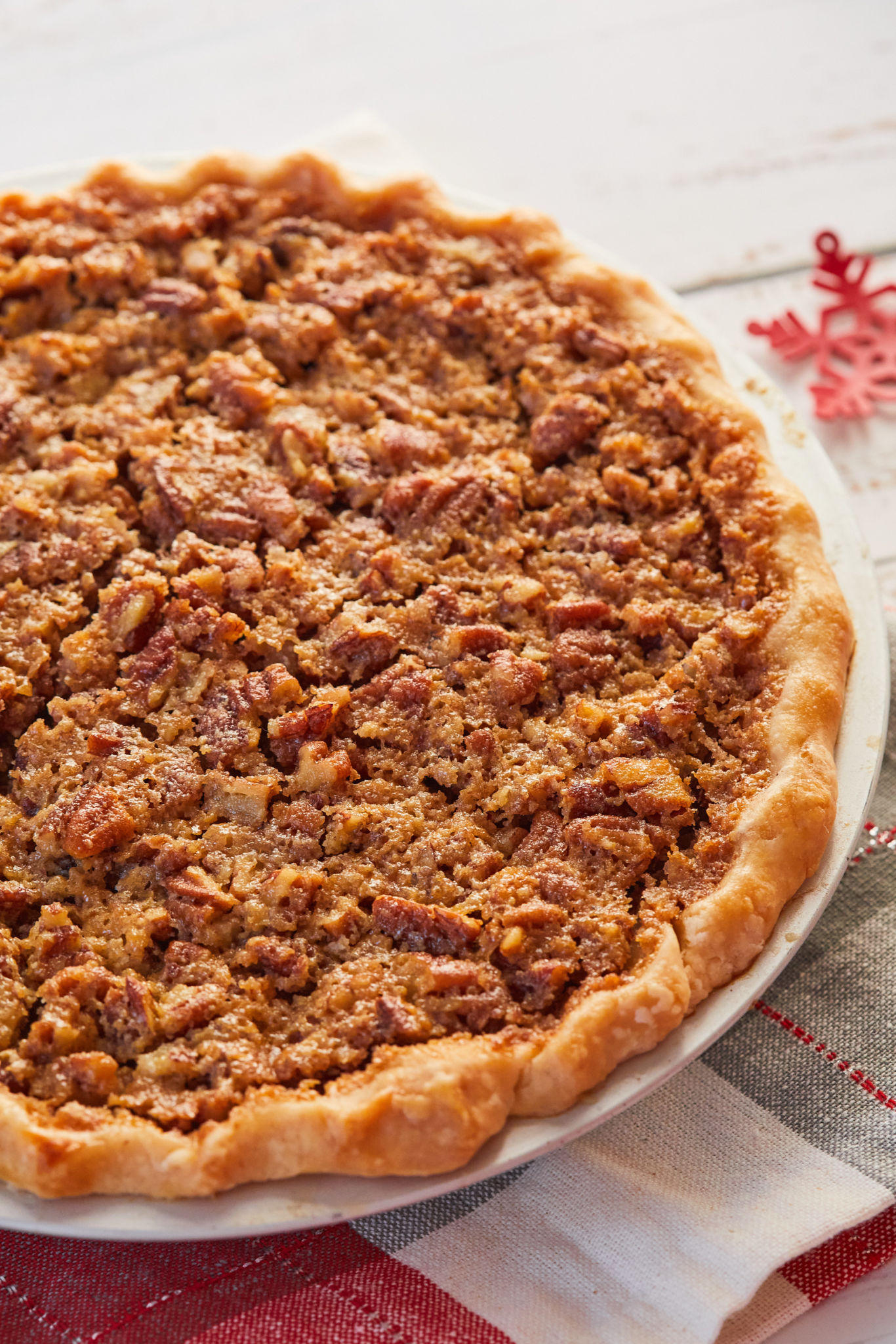A whole American Buttermilk Pecan Pie, to show the texture and pecans.