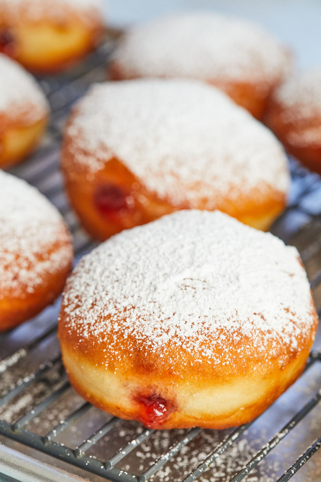 Hannukkah Jelly Donuts dusted with powdered sugar.