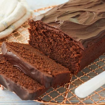 A chocolate pound cake cut into slices.