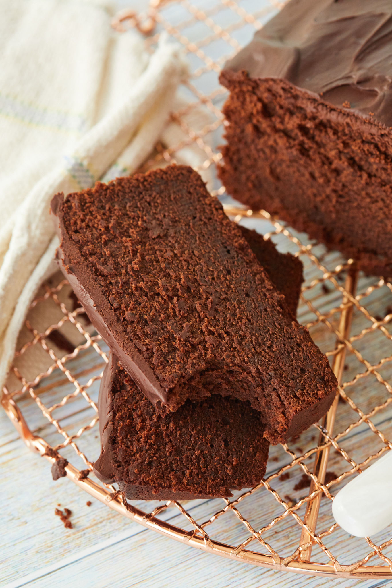 Slices of chocolate pound cake, showing the interior texture.