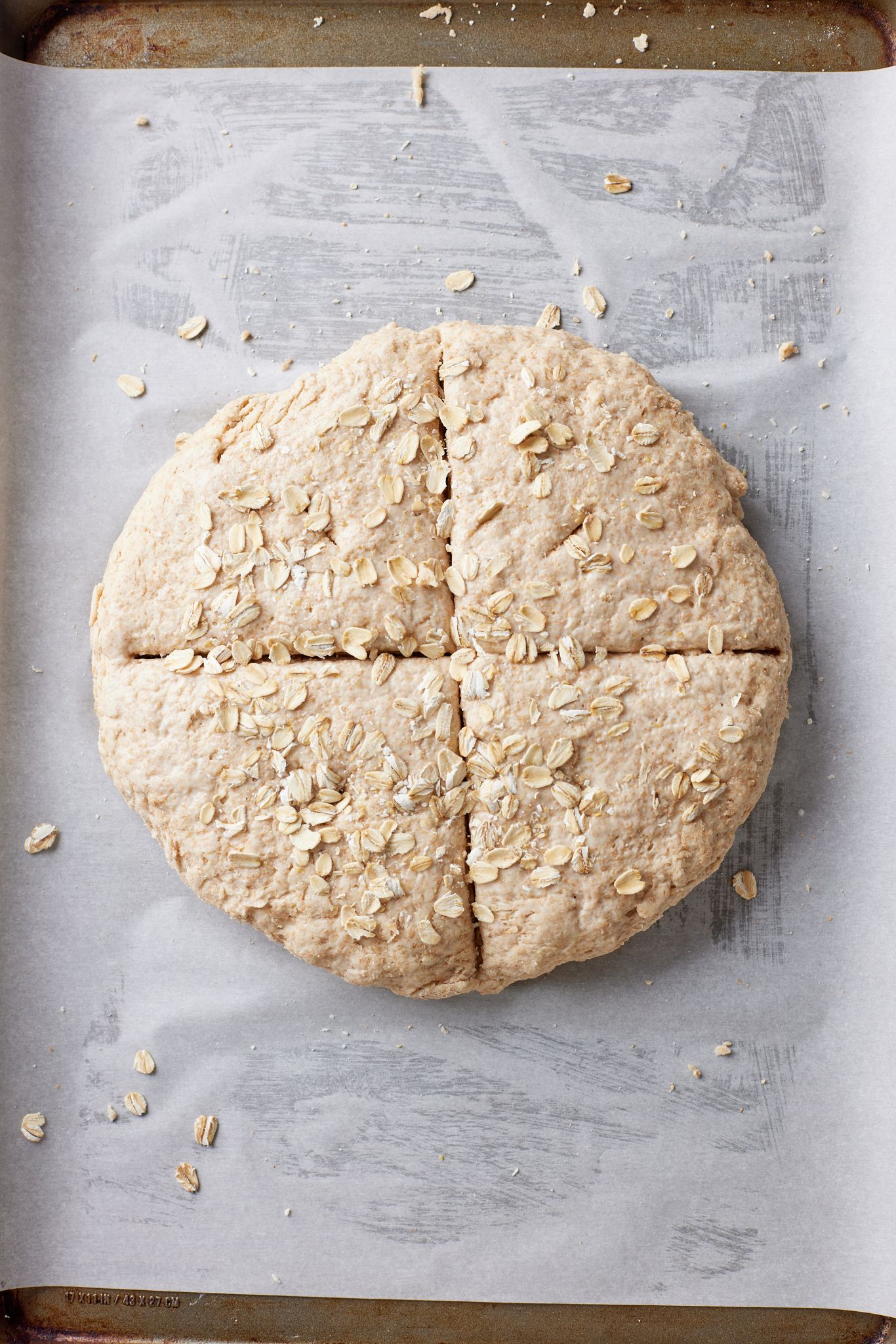 Soda Bread is glazed with buttermilk leftover and sprinkled with oats. 