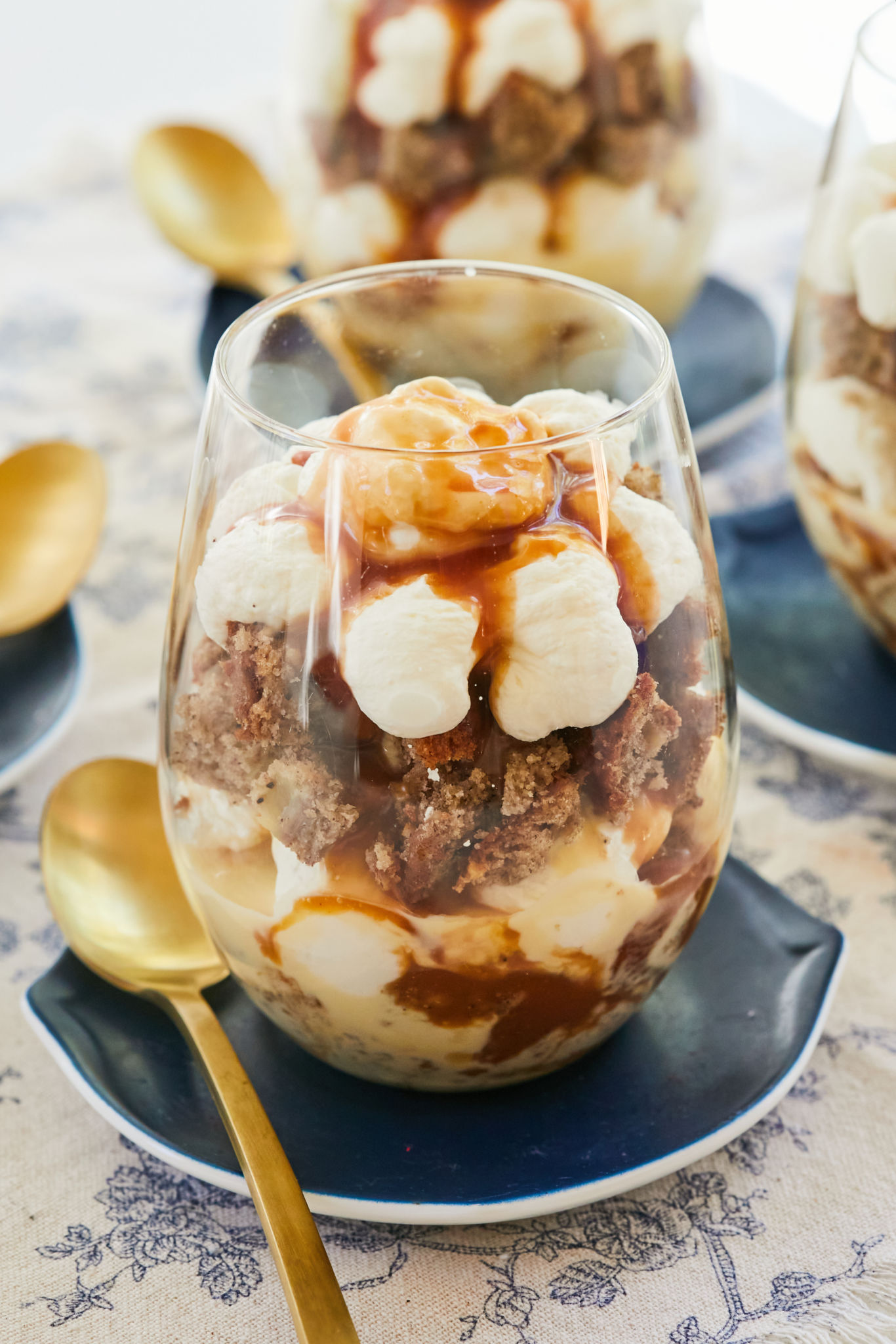 A glass full of banana bread trifle.