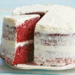 A red velvet cake topped with easy ermine frosting.