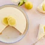 Top-down view of my Lemon Jello Cheesecake, with slices removed.