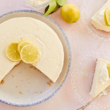 Top-down view of my Lemon Jello Cheesecake, with slices removed.