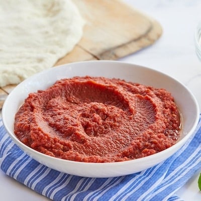 Homemade Pizza Sauced swirled in a bowl