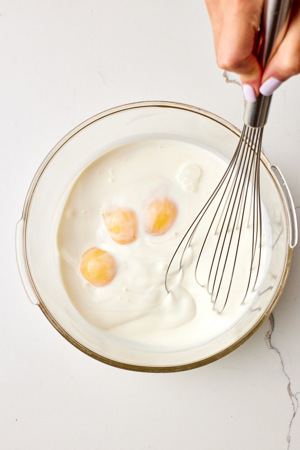 Make the custard mixture in a bowl.