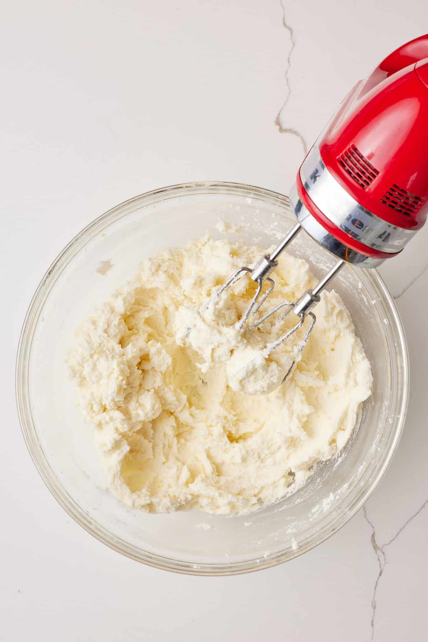 Cream butter and sugar together until light and fluffy for Microwave Chocolate Cake. 