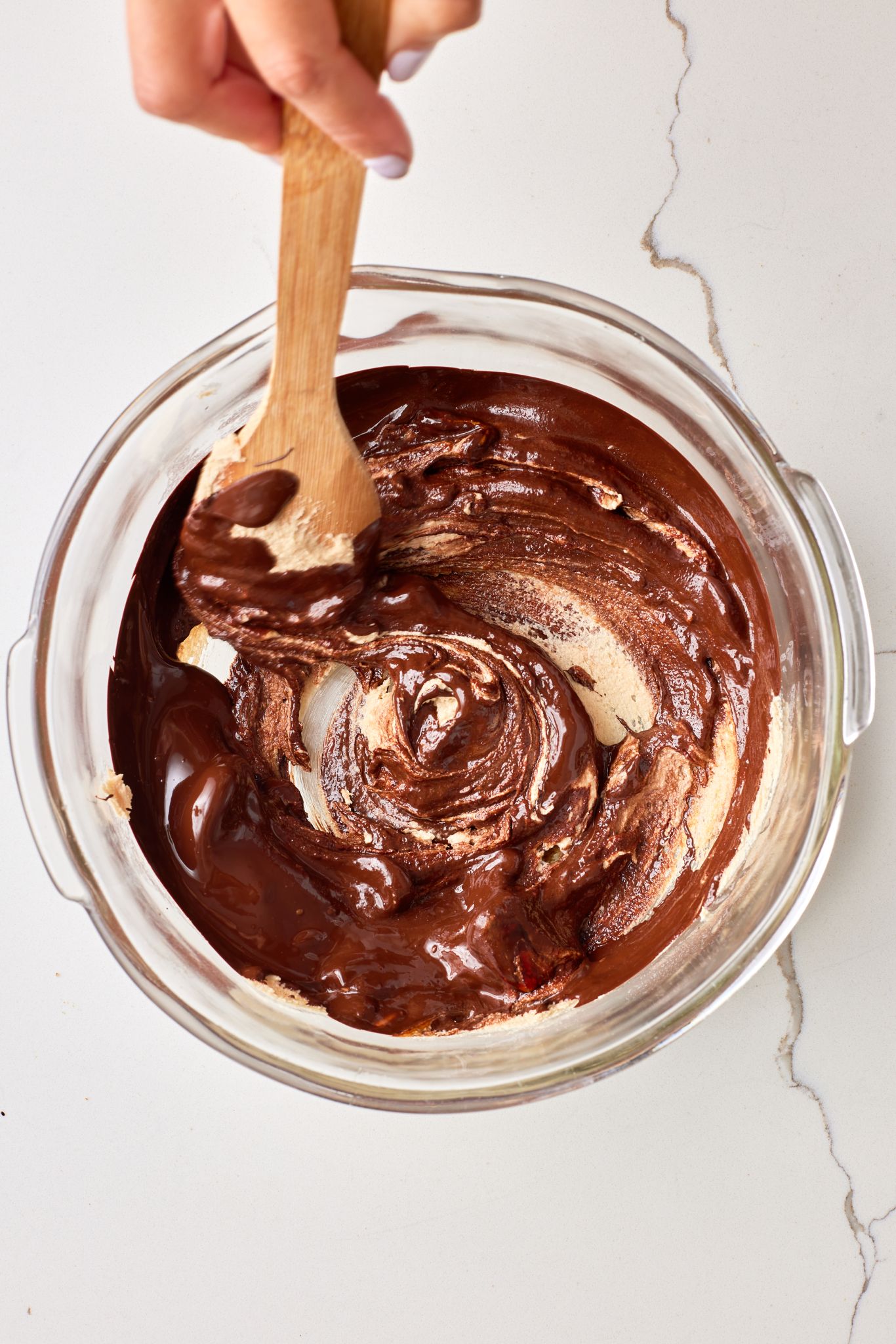 Mix in the yogurt, melted chocolate, and vanilla until smooth.