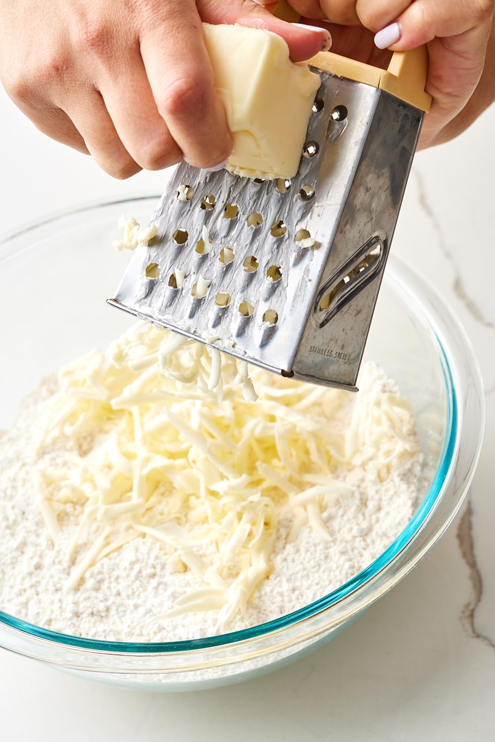 Strawberry Shortcake Recipe4 Grate butter into the dry ingredient mixture.