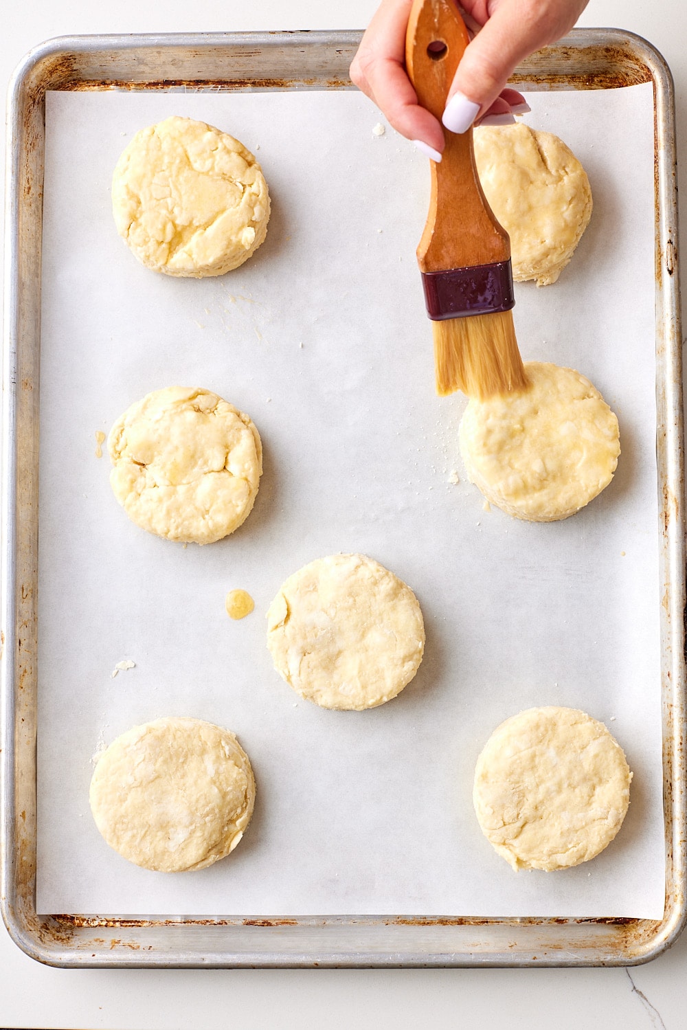 Strawberry Shortcake Recipe8 Place cut out biscuit on the tray and brush the top with egg wash.