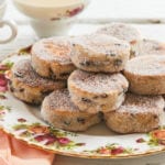 A plate full of sweet Welsh cakes.