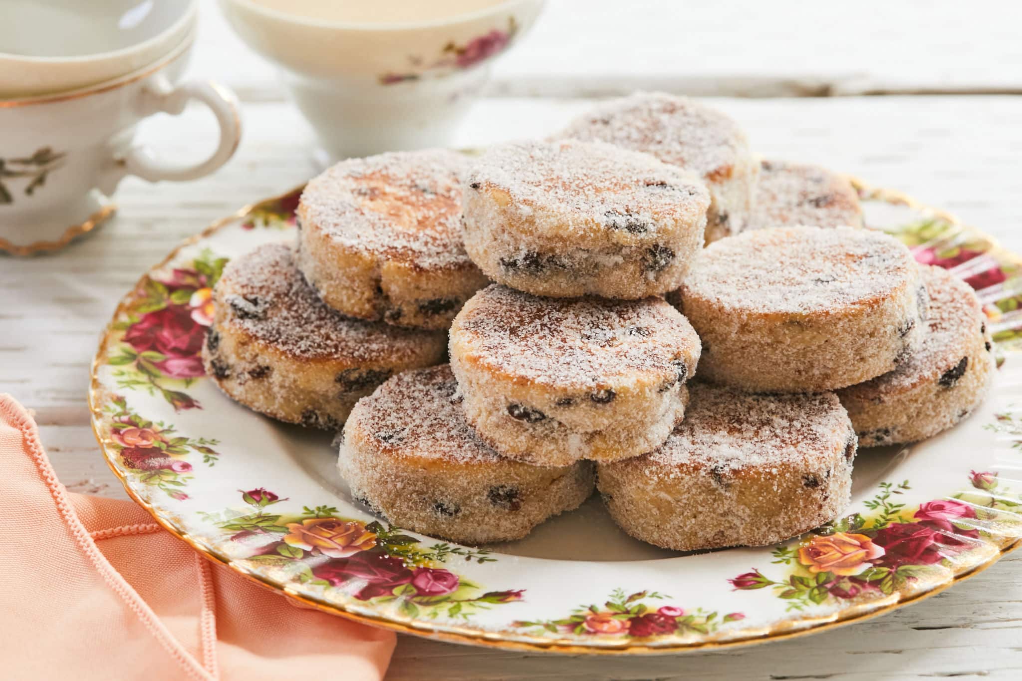 A plate full of sweet Welsh cakes.