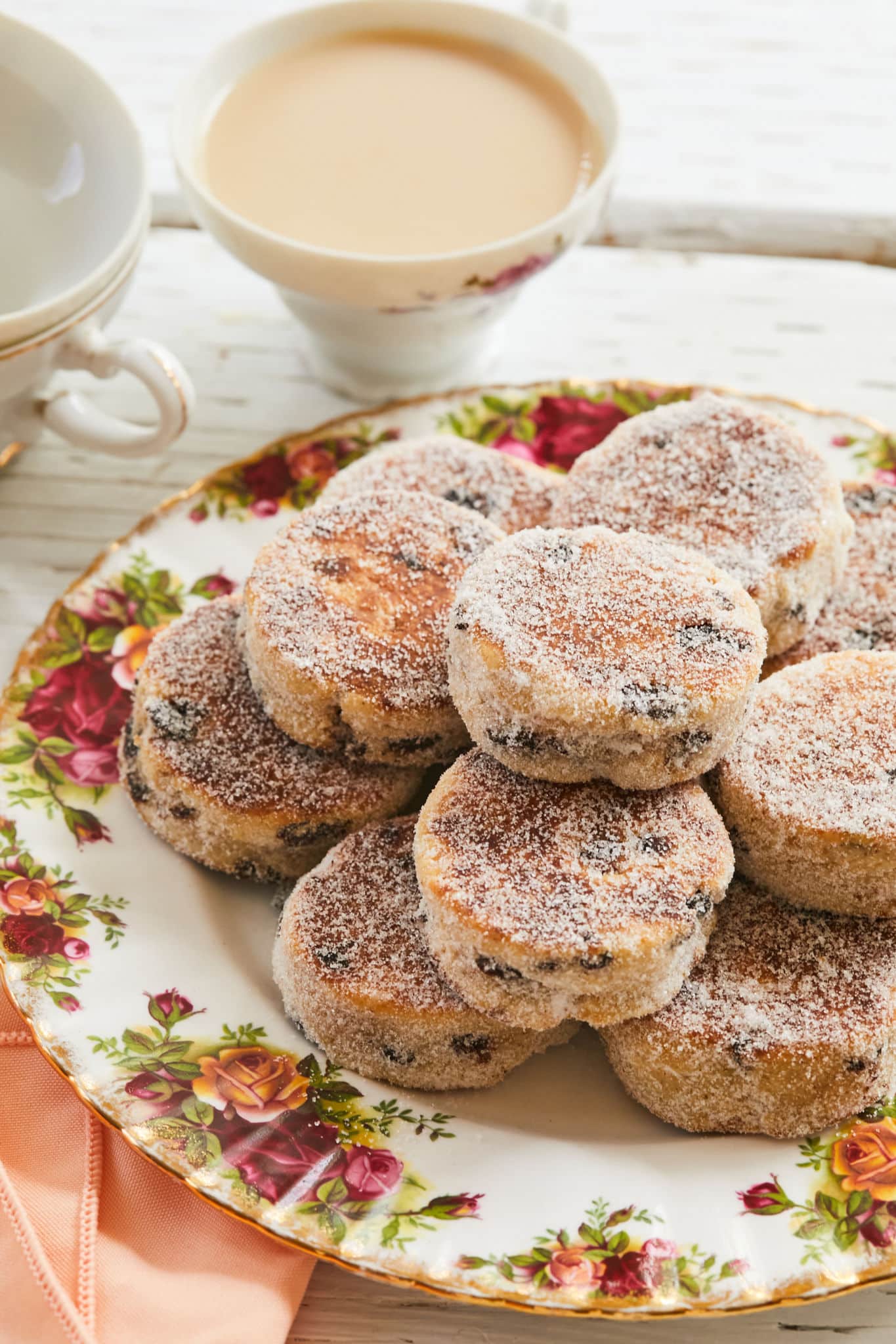 A plate of Welsh cakes stacked high.