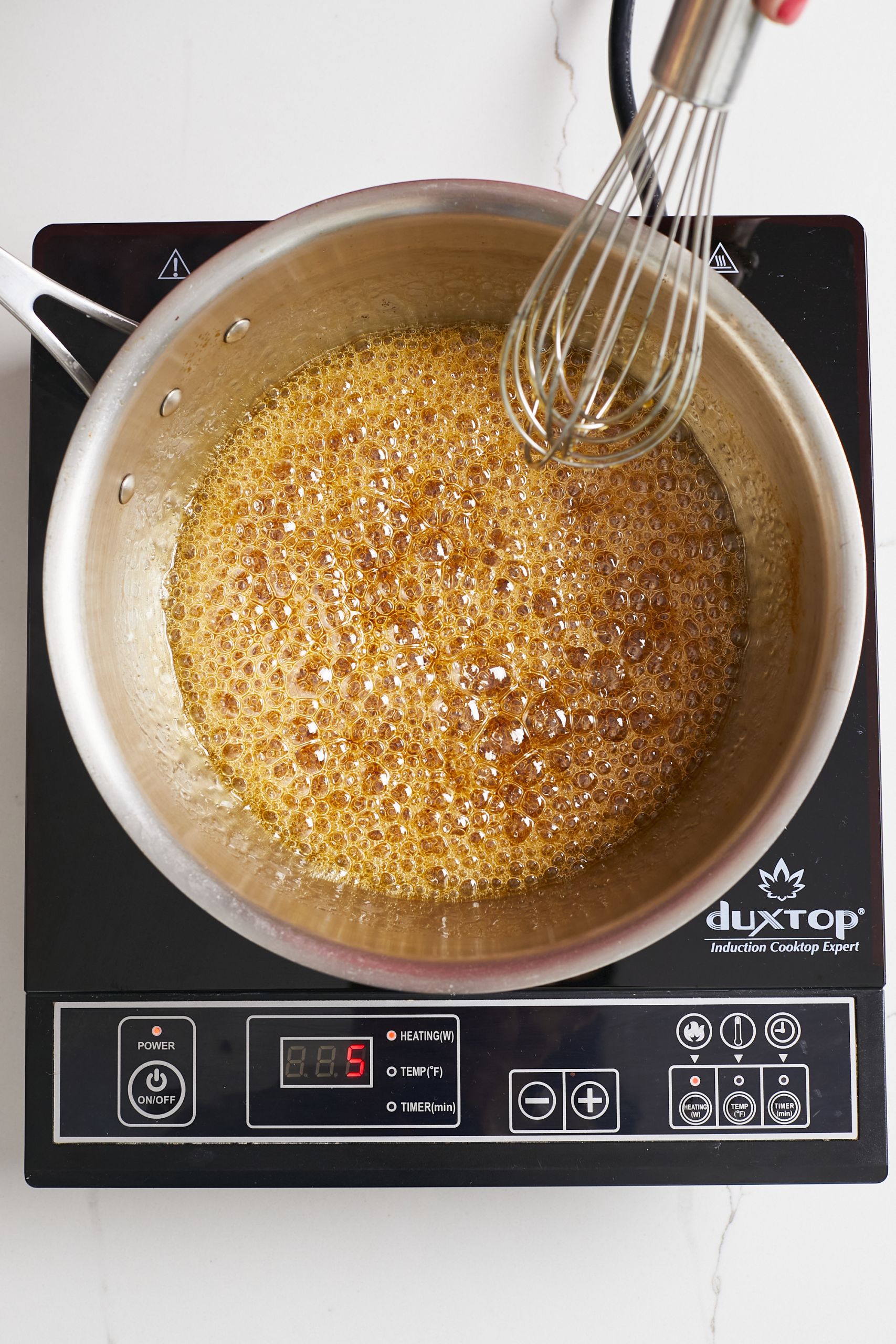 Simmer until it reaches a deep amber color. 