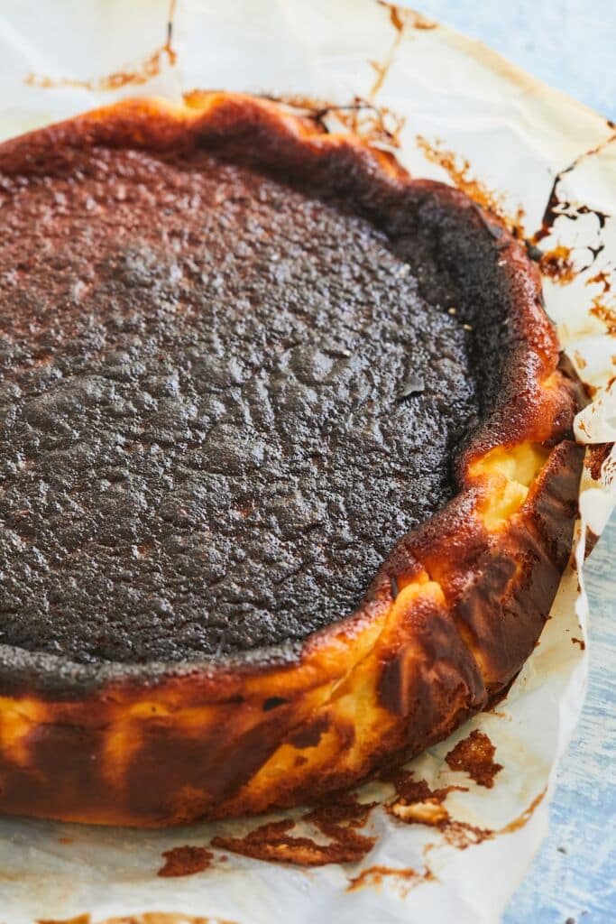 Basque cheesecake with a dark brown top.