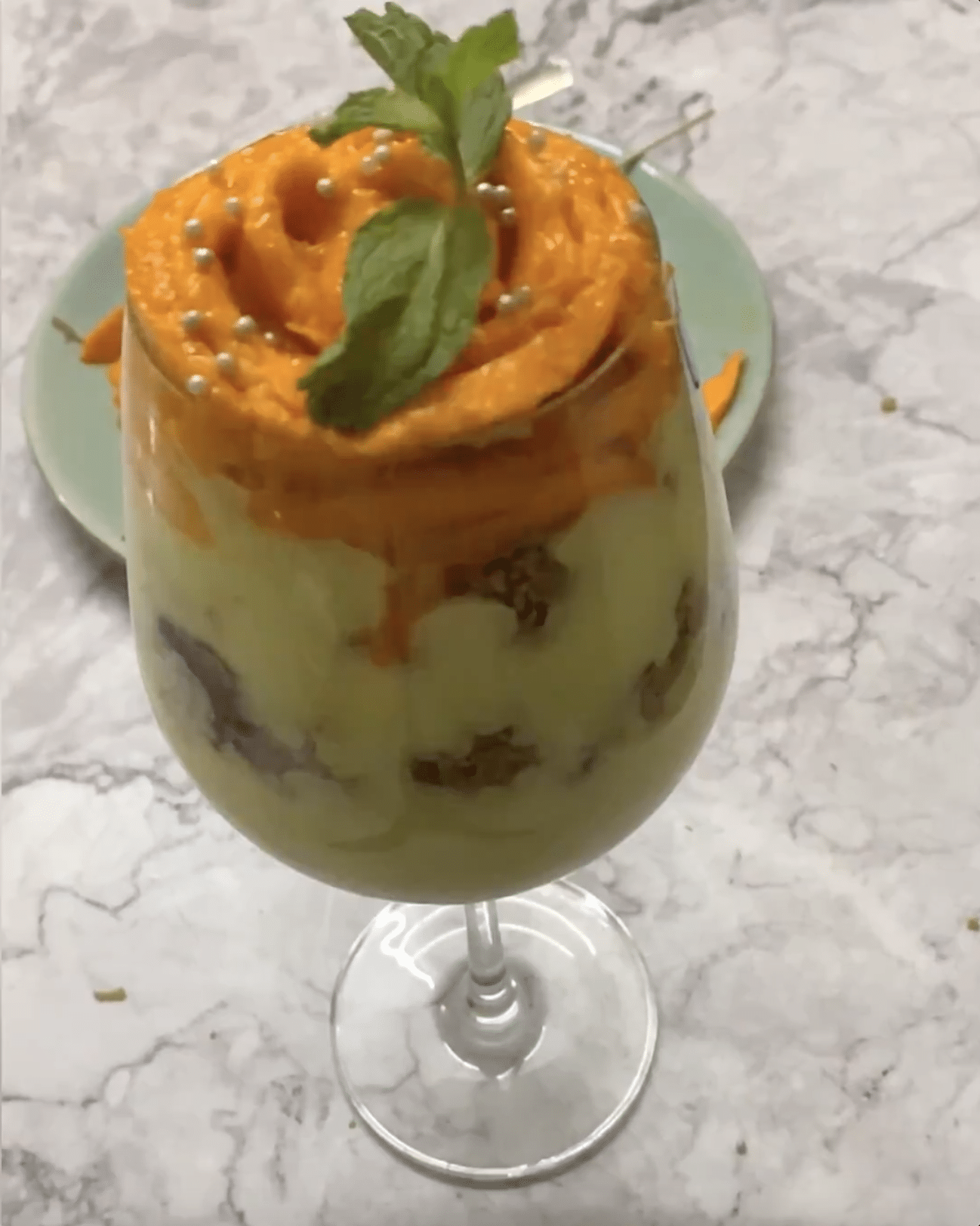 A mango trifle in a glass as part of our Summer Dessert Recipes roundup.