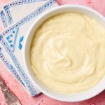 Top-down view of a bowl of silky smooth creme patisserie (pastry cream)