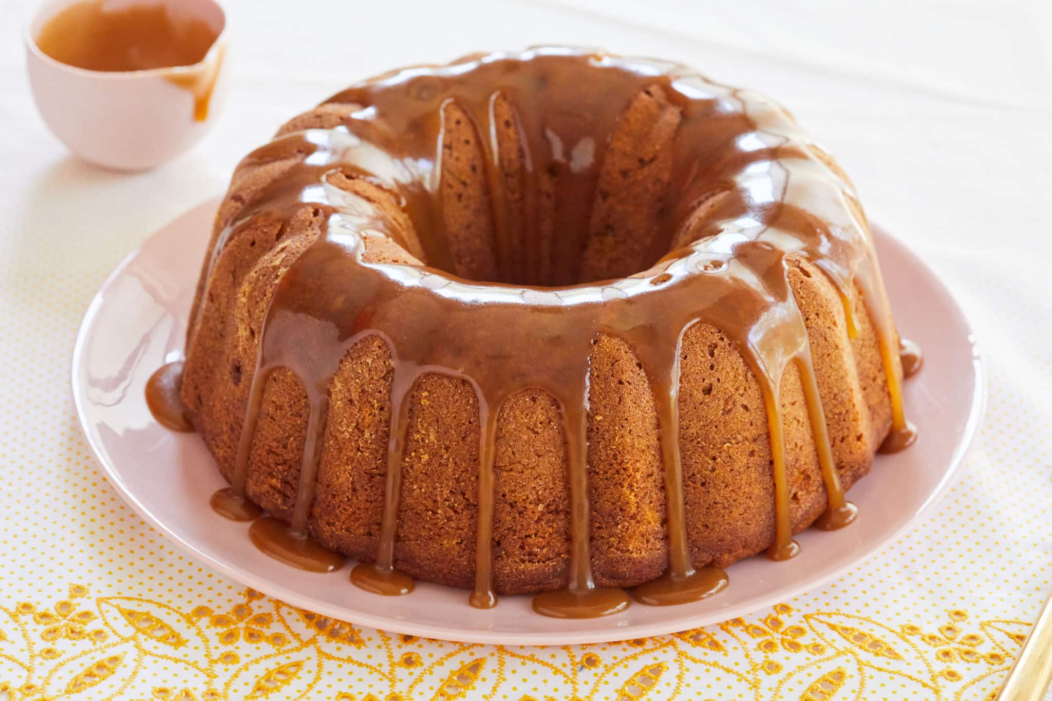 A gorgeous pumpkin bundt cake with brown sugar glaze.