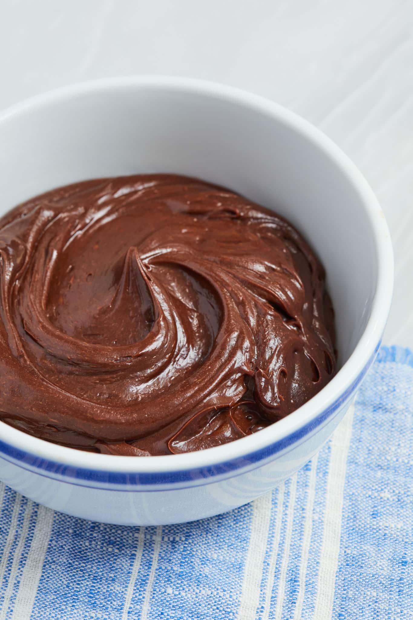 A close up of chocolate buttercream frosting.