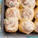 A tray of finished Cinnabon cinnamon rolls.