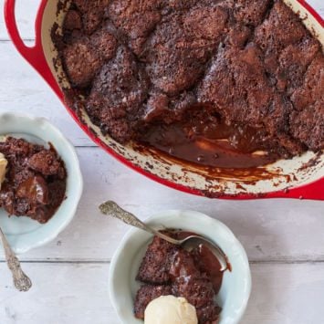 Chocolate cobbler served into two dishes with ice cream