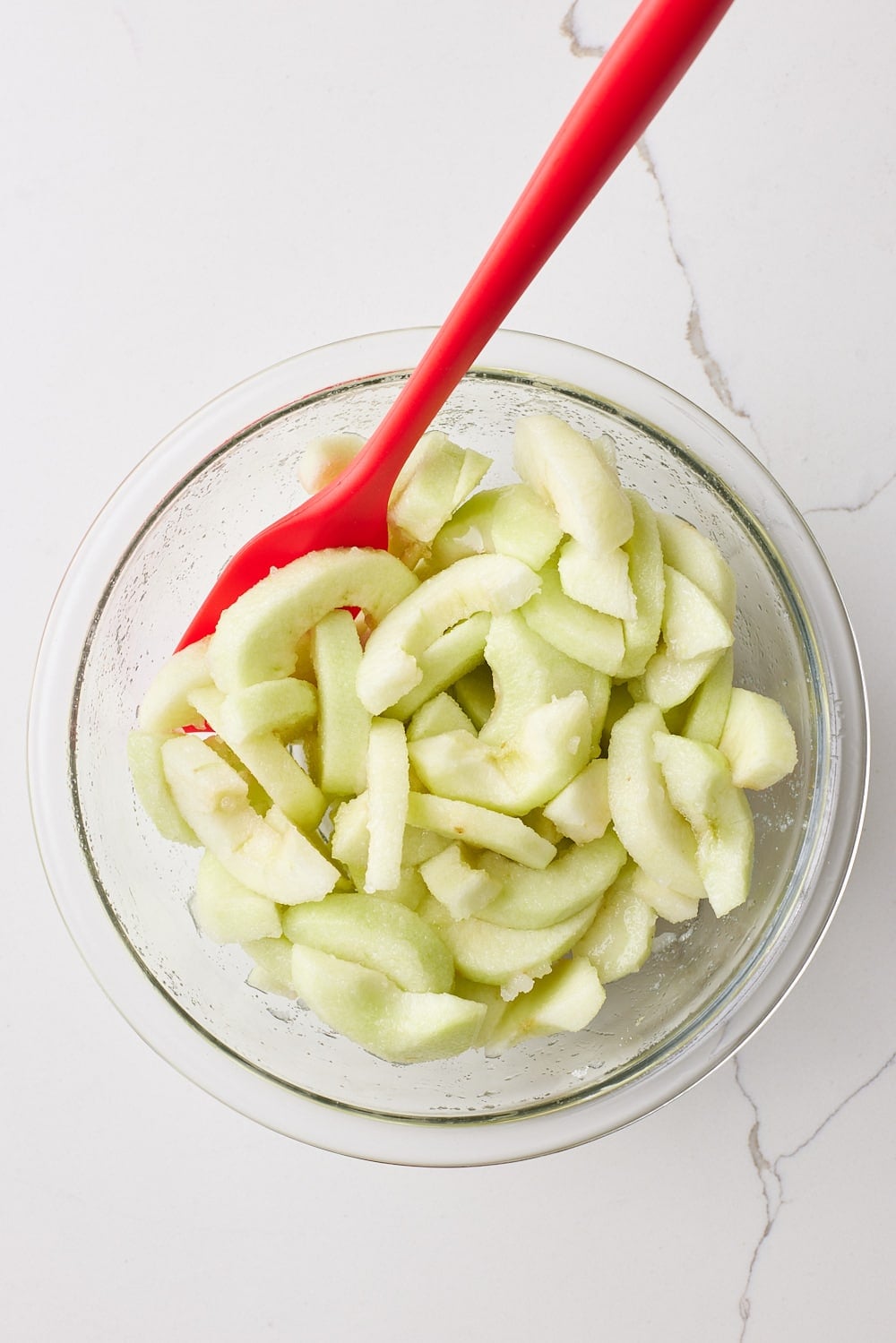Classic Irish Apple Tart2 Apple slices prepared in the bowl of Irish Apple Tart.