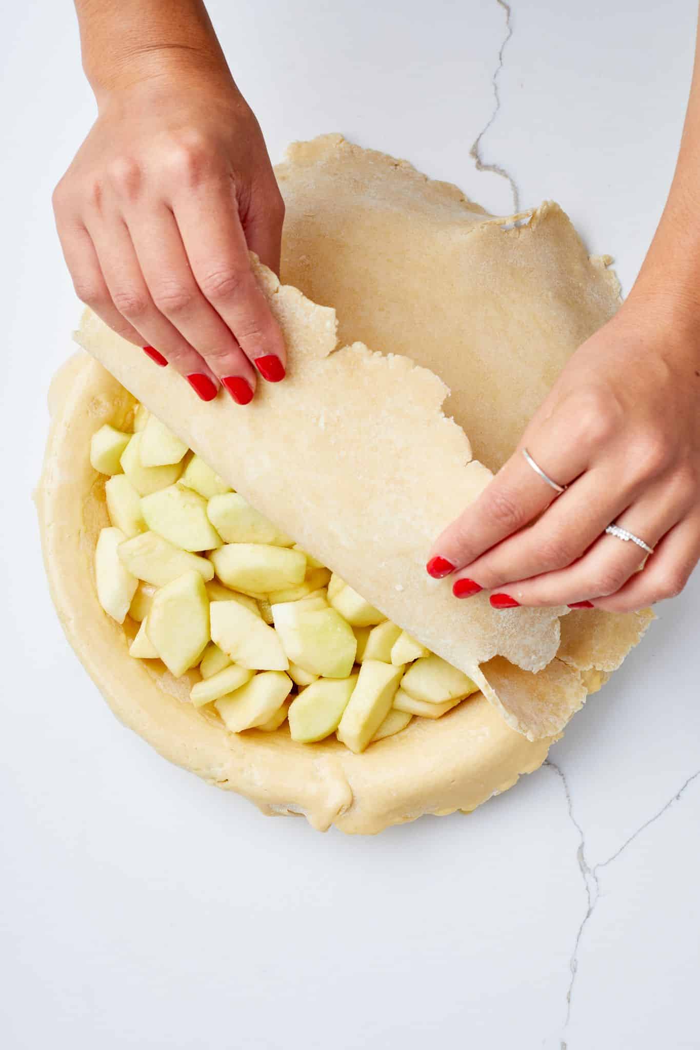 Classic Irish Apple Tart4 Put the top crust over the bottom crust and apple tart filling.