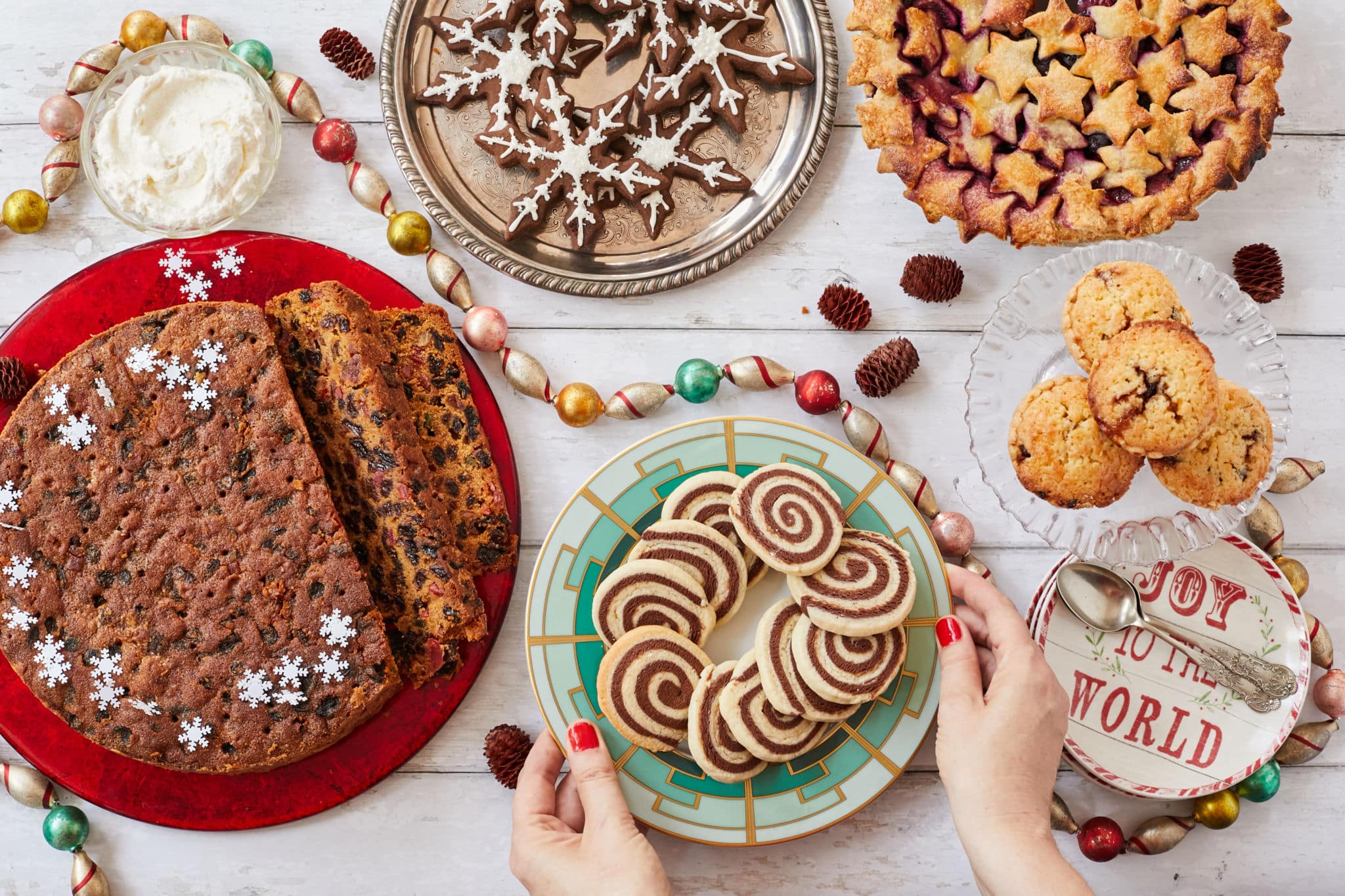 A table full of holiday desserts and dessert recipes.