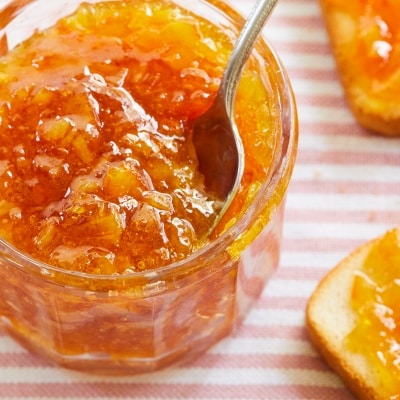 Thick, vibrant-orange color marmalade.