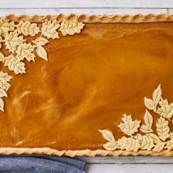 A pumpkin slab pie recipe with leaves as decorations.