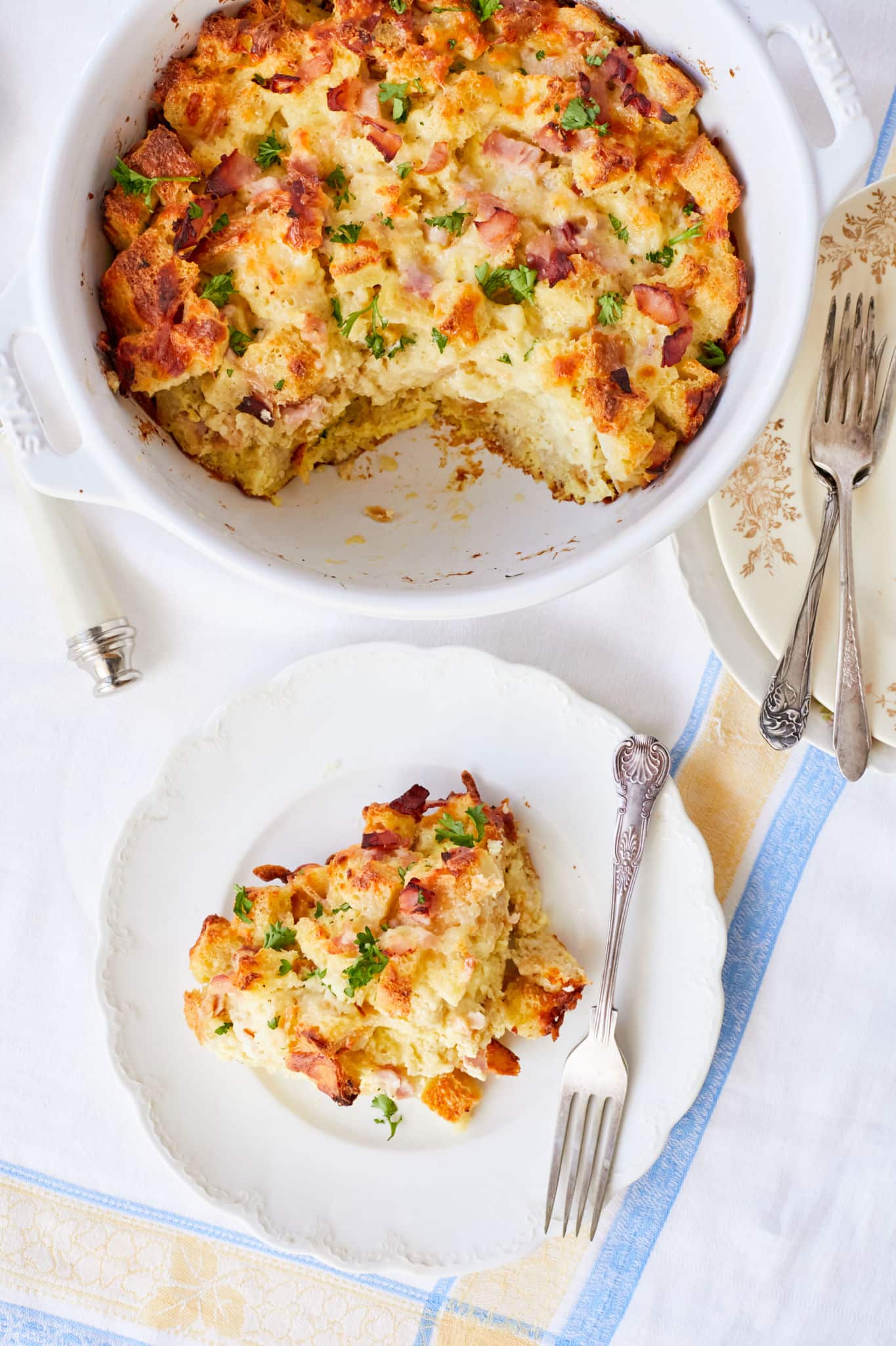 Savory bread pudding portioned onto a plate