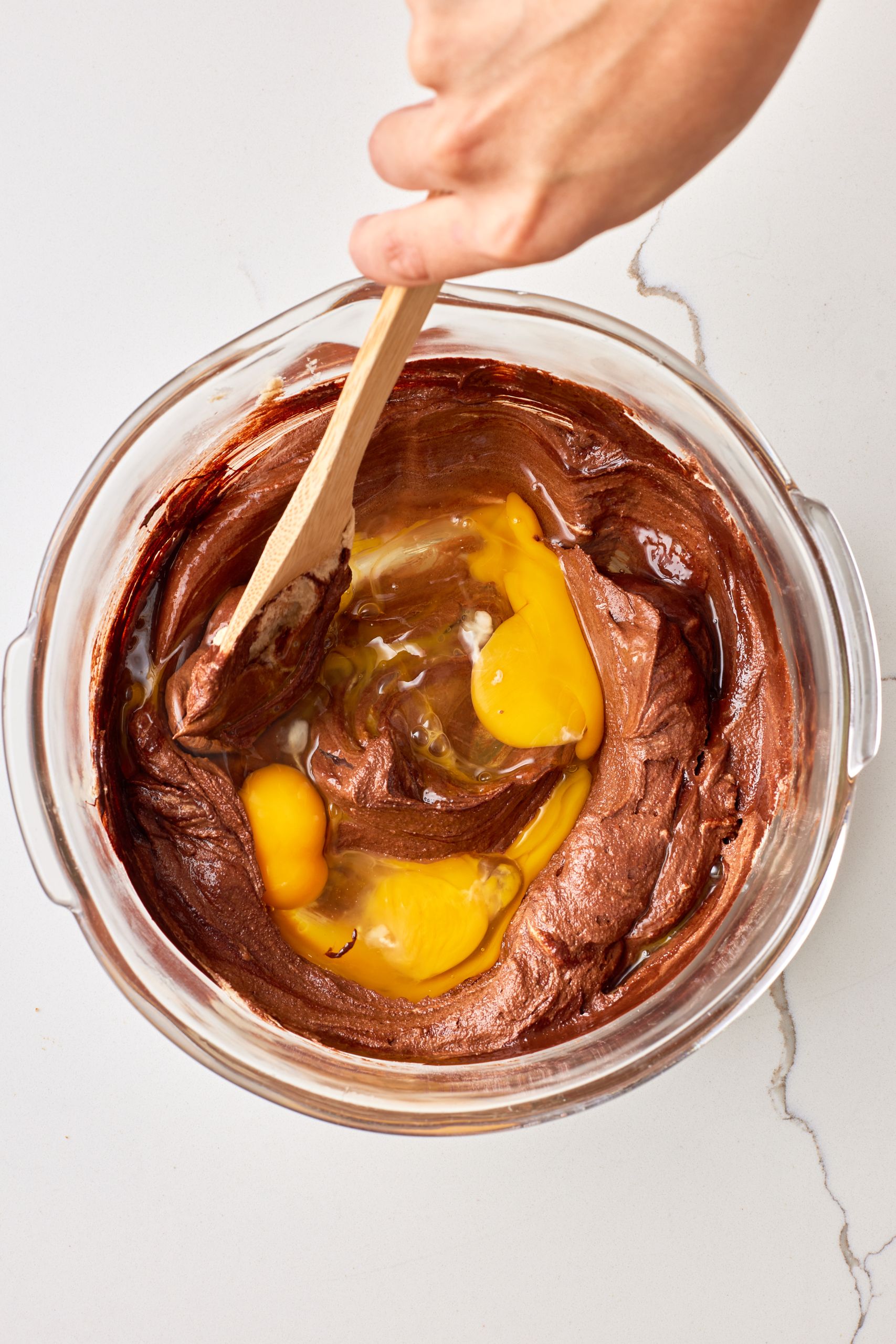 Triple Chocolate Chip Cookies9STEP5 Ad eggs one at a time until fully incorporated.