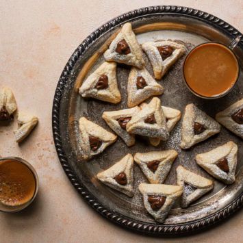 Hamantaschen Cookies served on a tray.