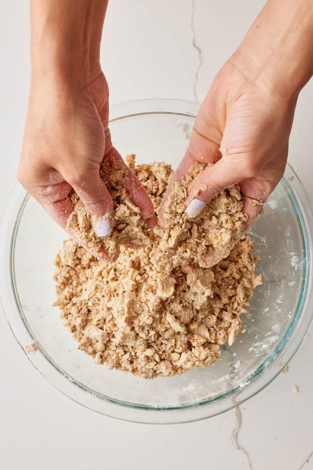 Cut butter into the mixture using a pastry cutter, or fingertips, until the mixture resembles coarse crumbs.
