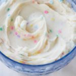 A bowl of funfetti frosting.