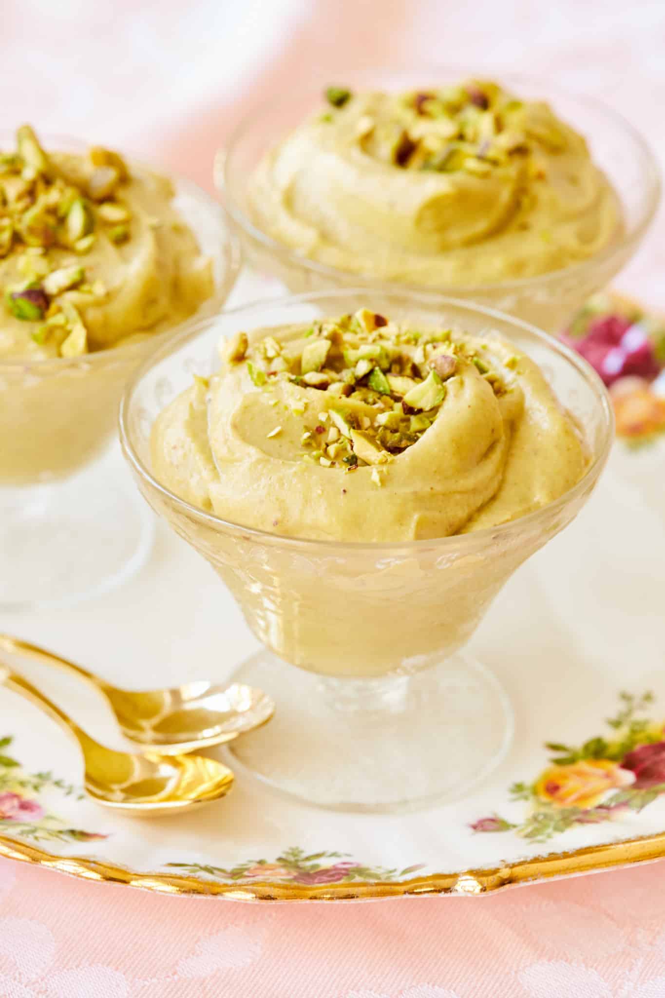 A close-up of pistachio pudding topped with pistachios