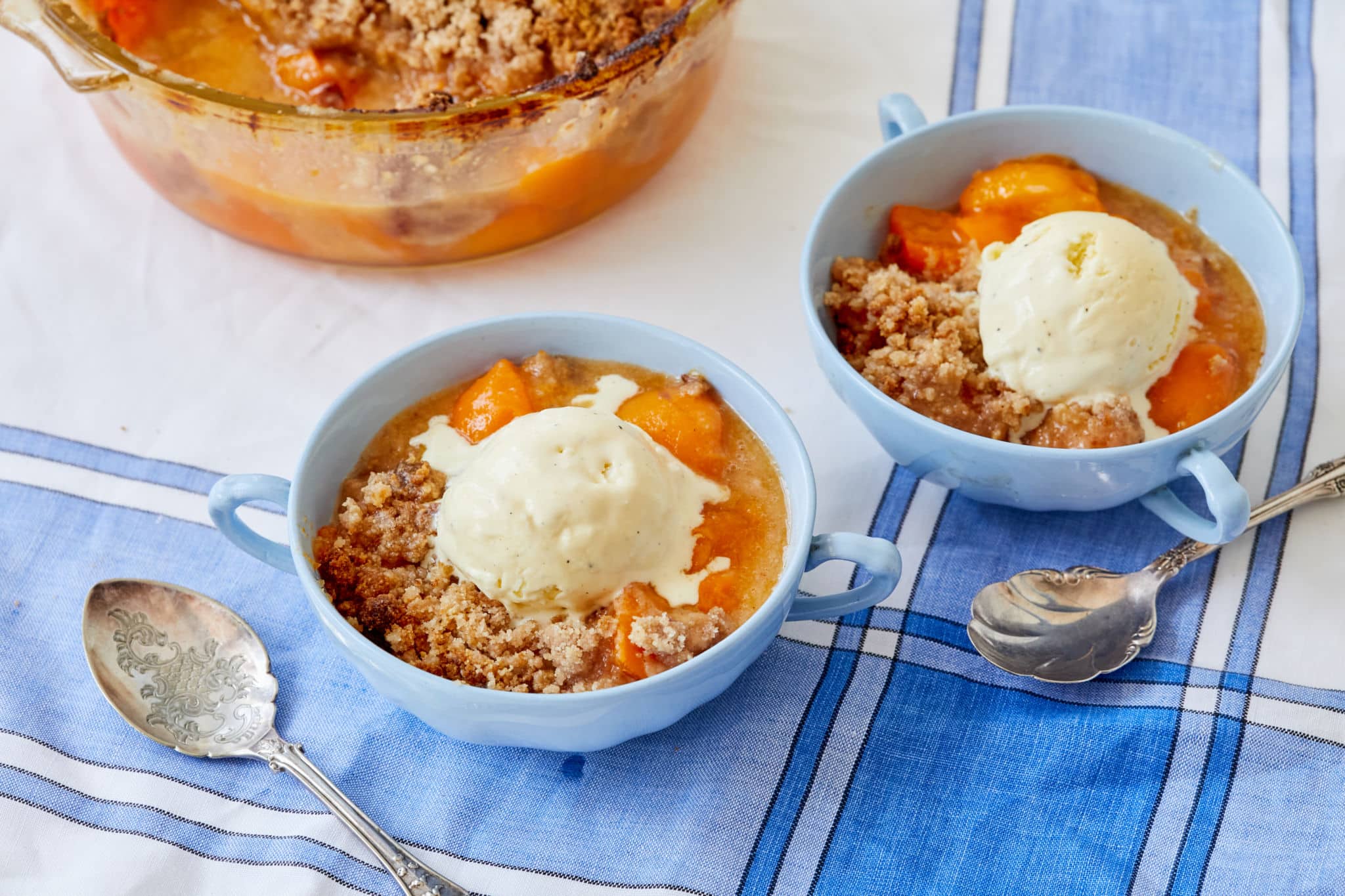 Two bowls of apricot crumble