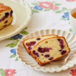 Slices of Blueberry Cream Cheese Quick Bread filled with blueberries