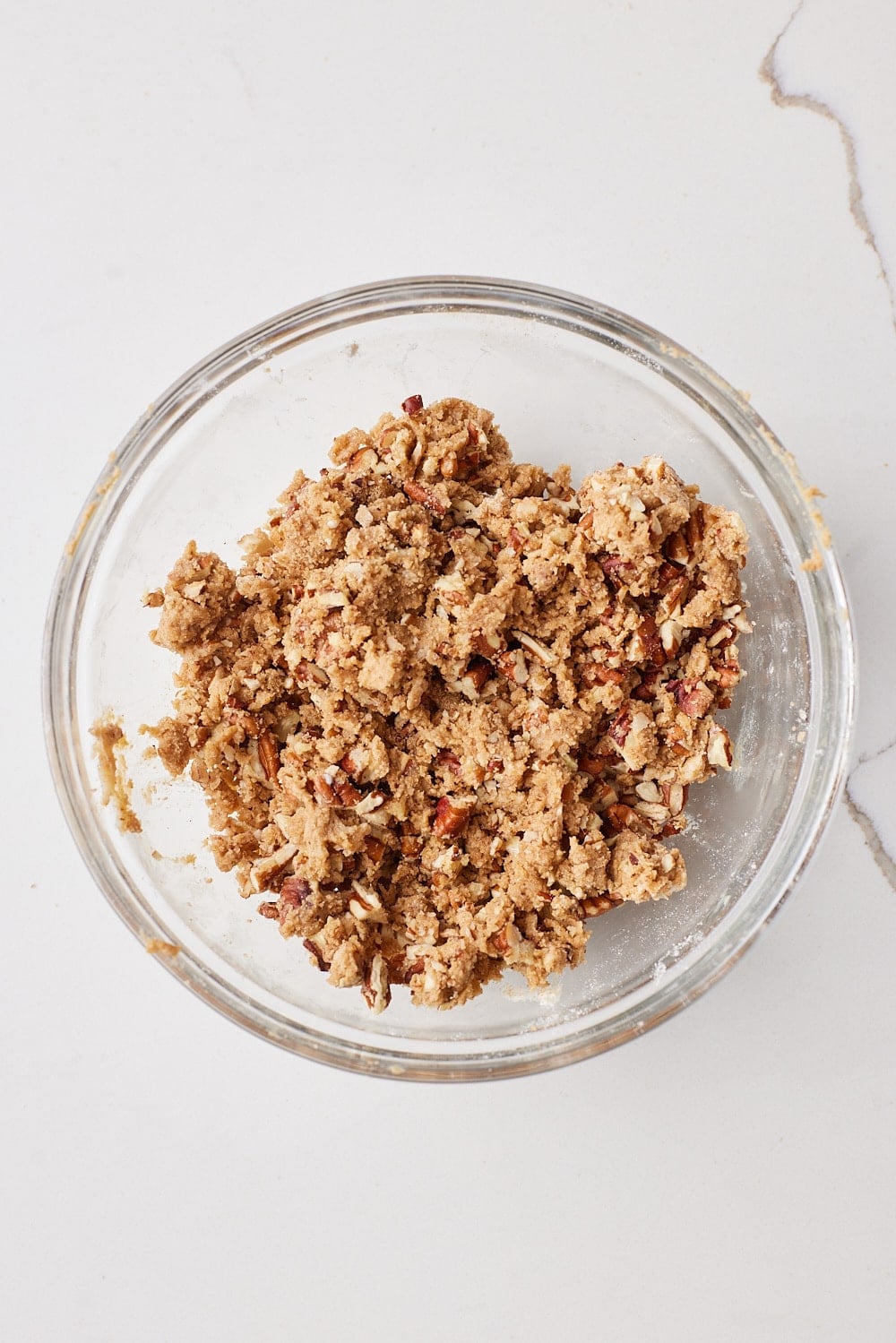 Add chopped pecans in the streusel topping . 