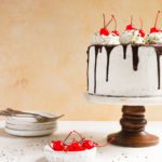 Cookies and Cream Ice Cream Cake with cherries on top