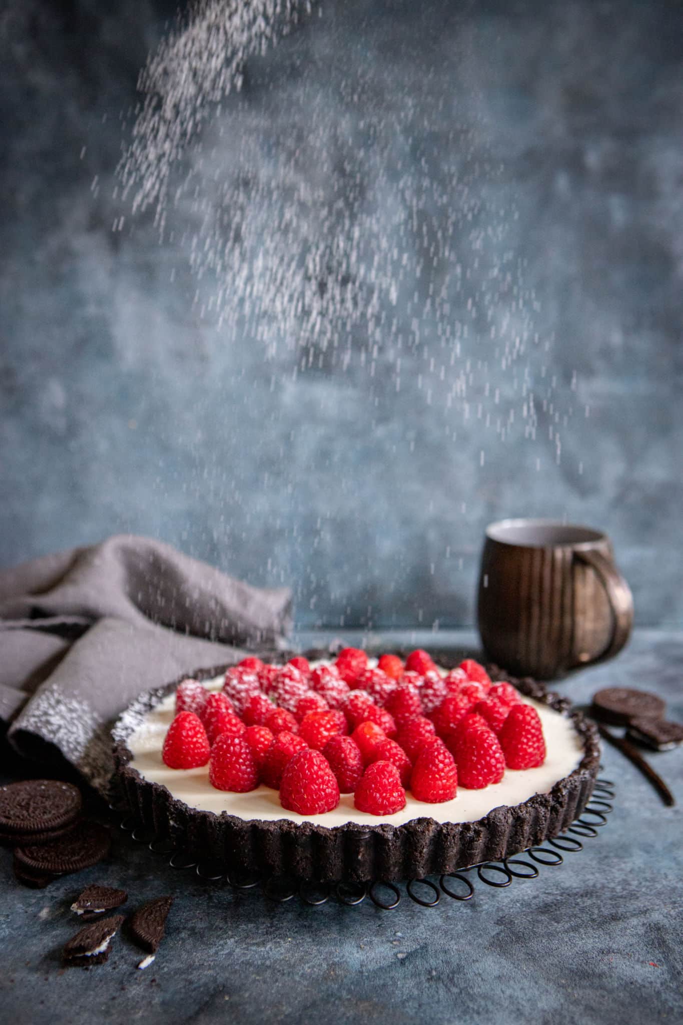 Whole Panna Cotta Tart topped with raspberries