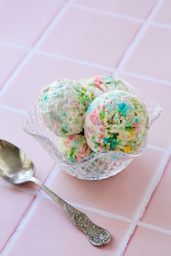 Scoops of rainbow ice cream in a bowl