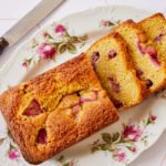 Strawberry Cornmeal Quick Bread sliced on a plate